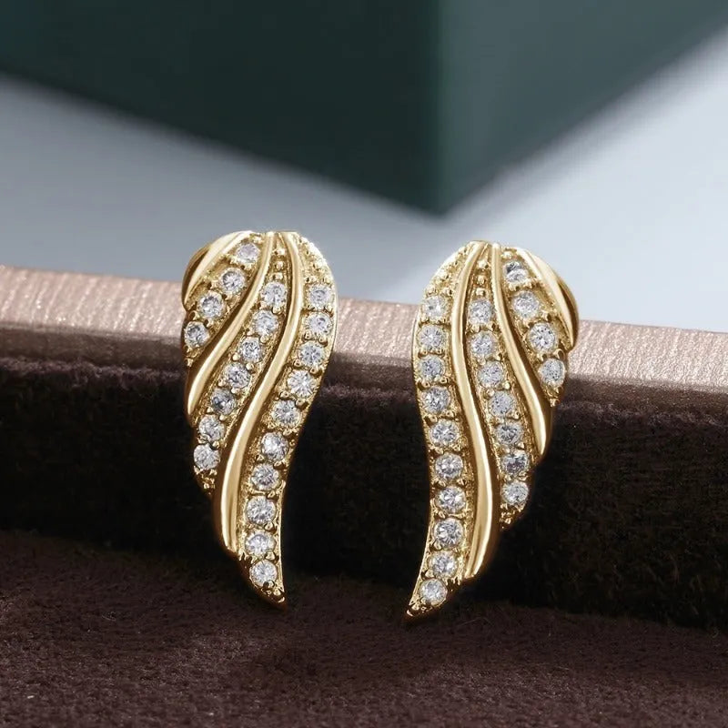ARGIA - Orecchini foglia in oro con pavé scintillante